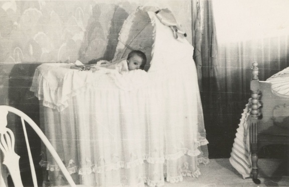 Carole Lee new baby in bassinet