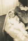 Carole Lee about 3 months with Cora rocking