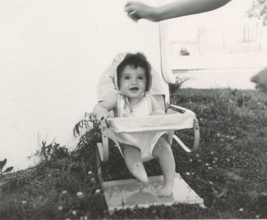 Carole Lee outside in baby chair 1941 2