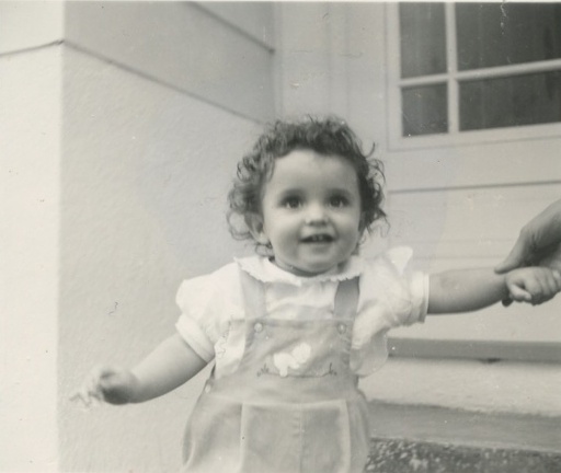 Carole Lee Stanard standing by front door 1941 2