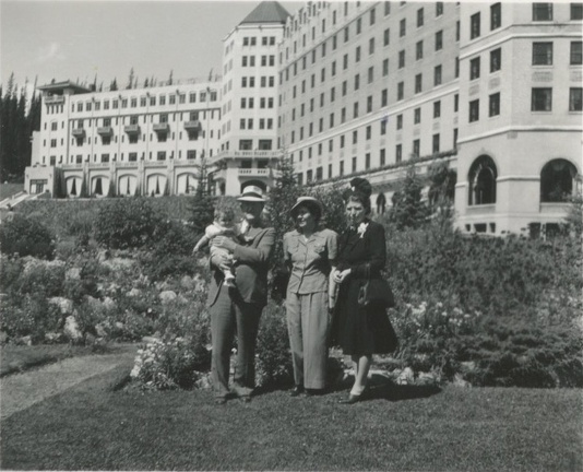Carole Lee with adults in front of Lake Louise Hotel 1941