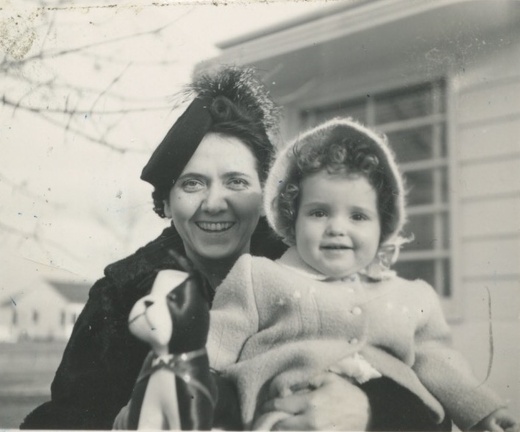 Cora and Carole Stanard outside with toy dog 1941