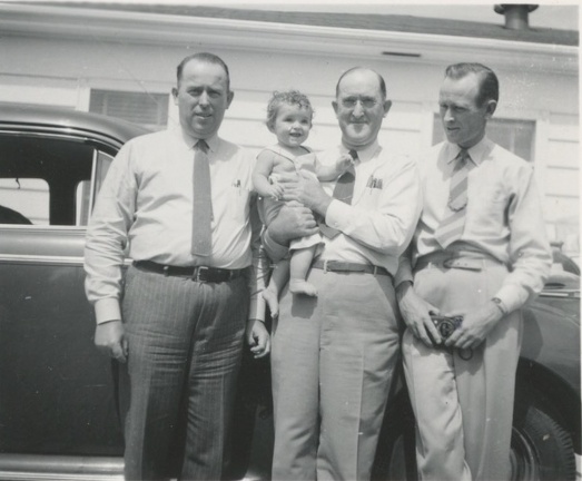 Earl, Carole, Ri (Uriah) and Ralph 1941 in front of house at 2700 4th Ave North, Great Falls, Montana 1