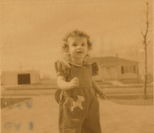 Carole Lee outside at 1 1:2 yrs old 1942