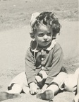 Carole Lee Stanard 1943 Whitefish Lake sitting on the beach