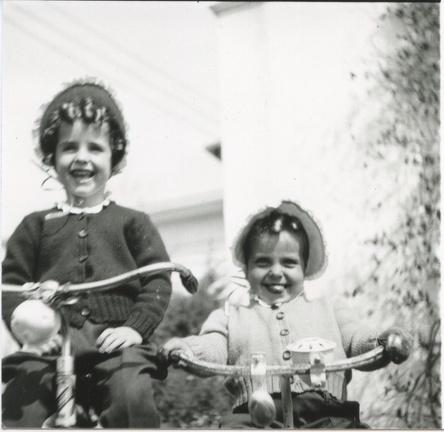 Carole Lee and Lynn Stanard riding bicycles 1944? 2